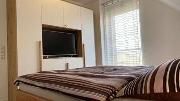 4 slaapkamers, een strijkplank/strijkijzer, wifi