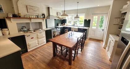 Cosy and warm old school country house surrounded by countryside and walks