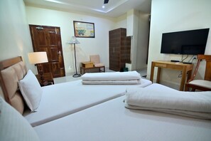 Executive Room, City View | Desk, laptop workspace, iron/ironing board, free WiFi - Joyable Homestay (Guwahati)
