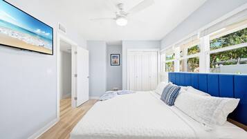 1 bedroom, desk, iron/ironing board, travel crib