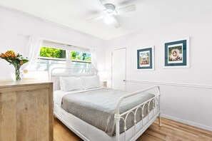 1 bedroom, desk, iron/ironing board, travel crib