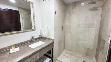 Shower, rainfall showerhead, hair dryer, towels