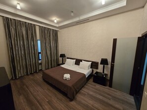 Basic Suite, Beach View | Desk, blackout curtains, iron/ironing board, bed sheets - Golden Beach By ShamBaku (Baku)