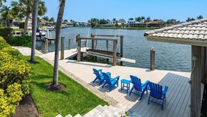 Property grounds - Waterfront 4BR Marco Island home with heated pool, WiFi & kitchen. (Marco Island)