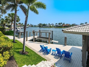 Property grounds - Waterfront 4BR Marco Island home with heated pool, WiFi & kitchen. (Marco Island)