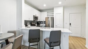 Fridge, dining tables - Landing | Beautiful 1BD, Gym, Yoga Studio (Savannah)