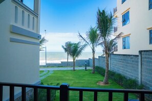 Premium Triple Room | Pemandangan pantai/laut