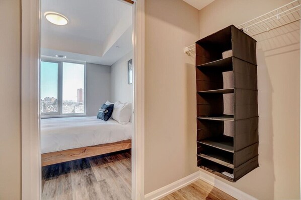 1 bedroom, desk, iron/ironing board, travel crib