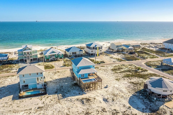 We are just a short barefoot walk from the beach path, where the roads join to T