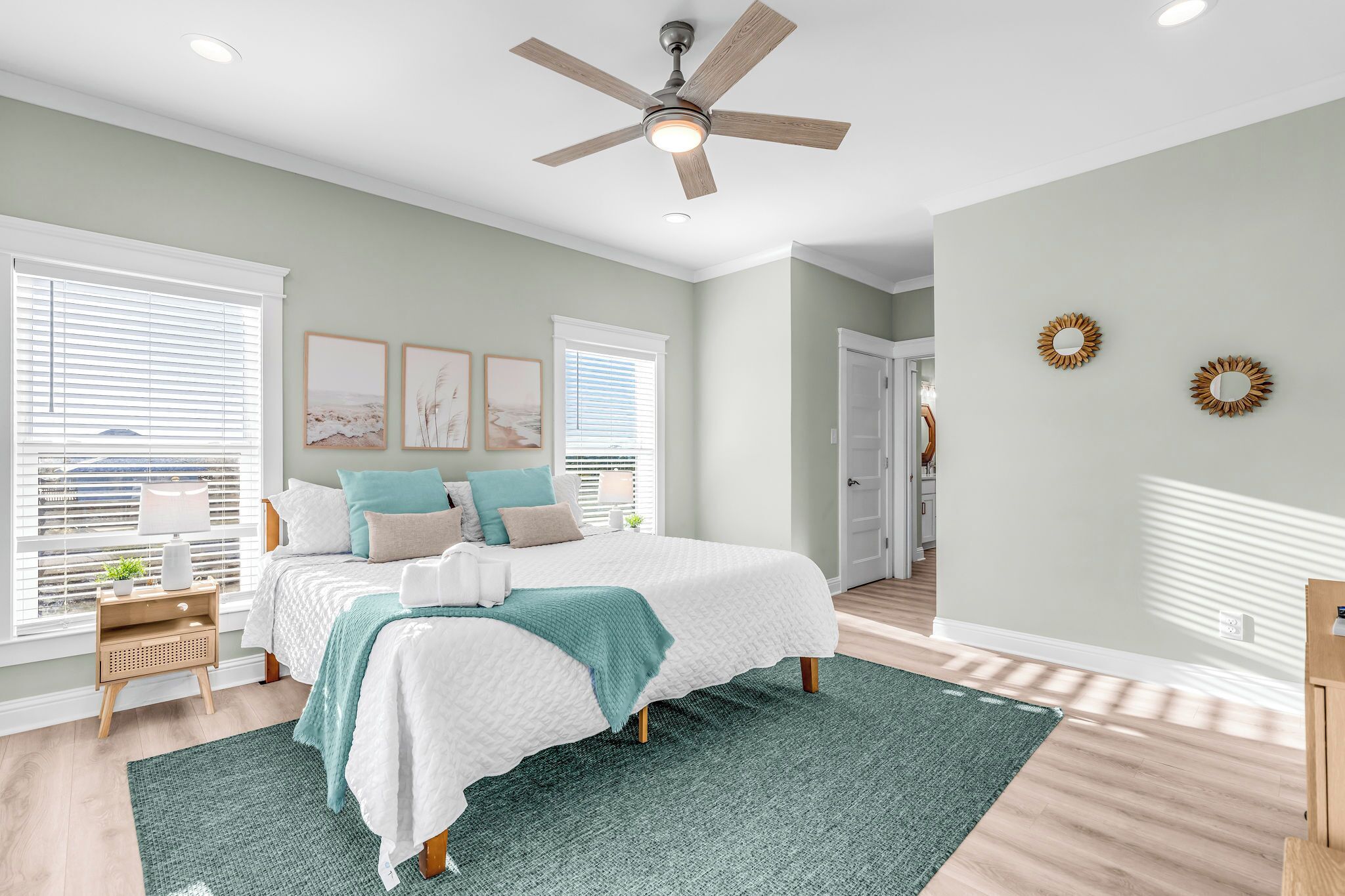 Main Floor king suite, private bathroom, deck access, Roku TV & clothing storage