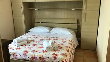 2 quartos, ferros/tĂĄbuas de passar roupa, Wi-Fi, roupa de cama