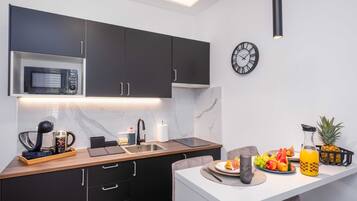Design Apartment (One bedroom Apartment - 3) | Private kitchen | Fridge, dining table