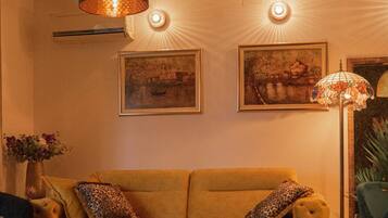 Apartment (One Bedroom Apartment with Balcony) | Living room | 32-inch flat-screen TV with digital channels