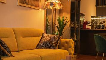 Apartment (One Bedroom Apartment with Balcony) | Living room | 32-inch flat-screen TV with digital channels