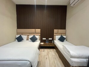 Deluxe driepersoonskamer | Gratis wifi, beddengoed