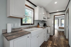 Fridge, microwave, oven, stovetop - Serene 1-Bedroom Tiny Home 1/2 Mile from Marina and Boat Ramp #406! (Jamestown)