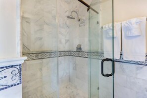 Shower, hair dryer, towels, soap