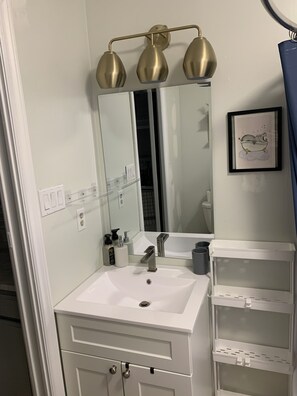 Hair dryer, towels, soap, shampoo