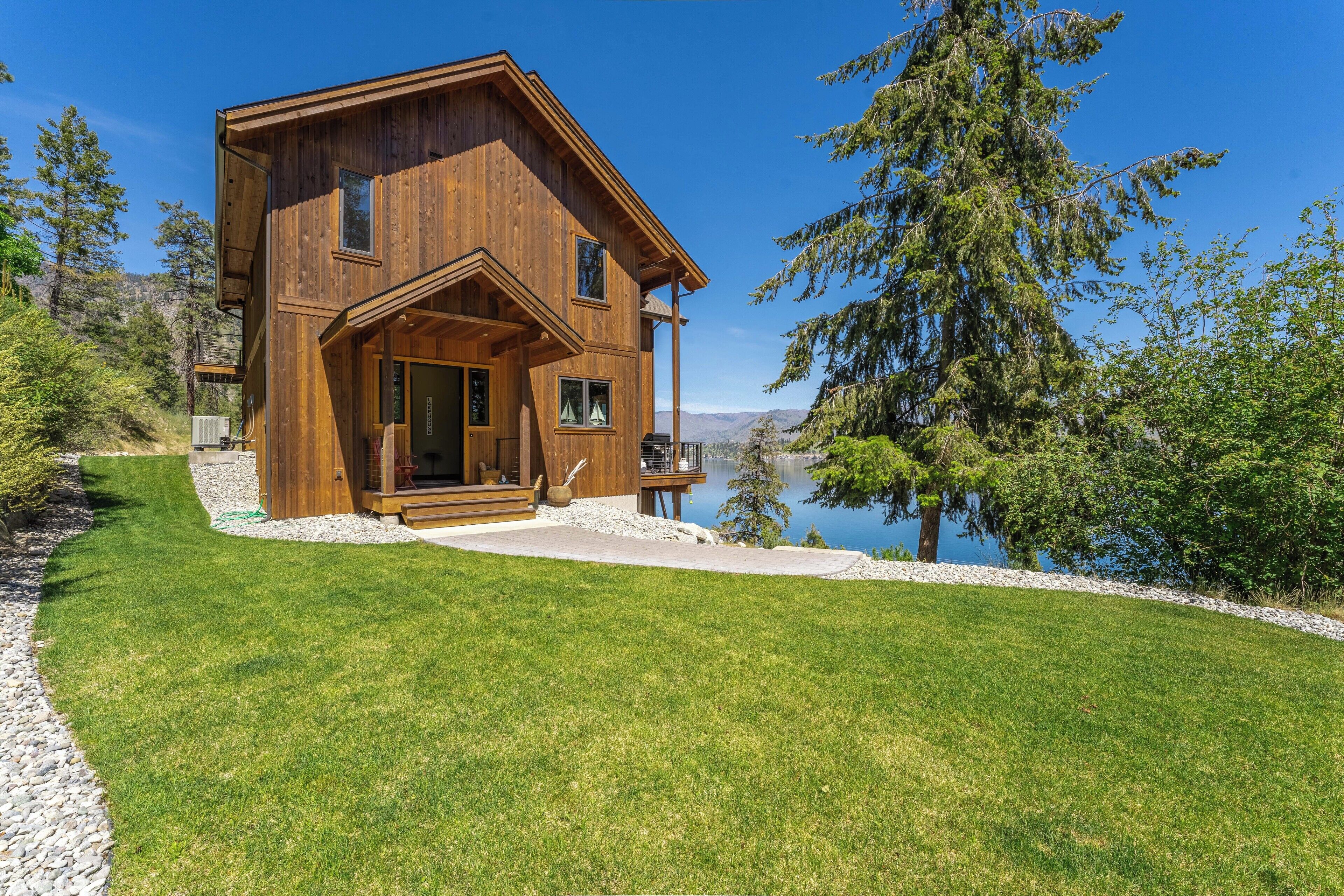 Beautiful home with lake access, private dock - unparalleled panoramic views!
