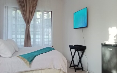 En-suite family size room with pool view.