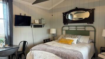 1 habitación, tabla de planchar con plancha, wifi gratis y ropa de cama