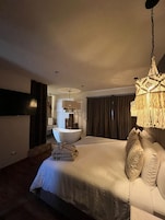 Habitación de lujo | Ropa de cama de alta calidad, wifi gratis, ropa de cama