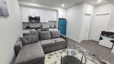 Brand New Cozy Luxury Suite with Modern Amenities and Prime Location