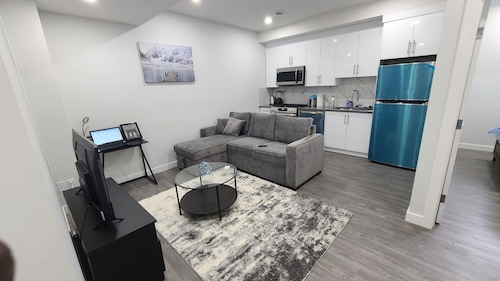 Brand New Cozy Luxury Suite with Modern Amenities and Prime Location