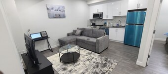 Brand New Cozy Luxury Suite with Modern Amenities and Prime Location