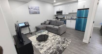 Brand New Cozy Luxury Suite with Modern Amenities and Prime Location