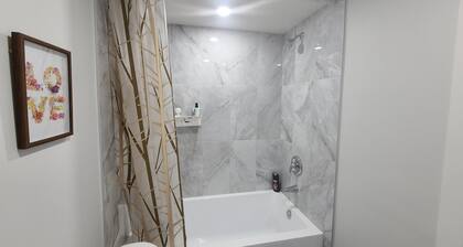 Brand New Cozy Luxury Suite with Modern Amenities and Prime Location