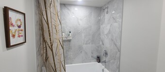 Brand New Cozy Luxury Suite with Modern Amenities and Prime Location