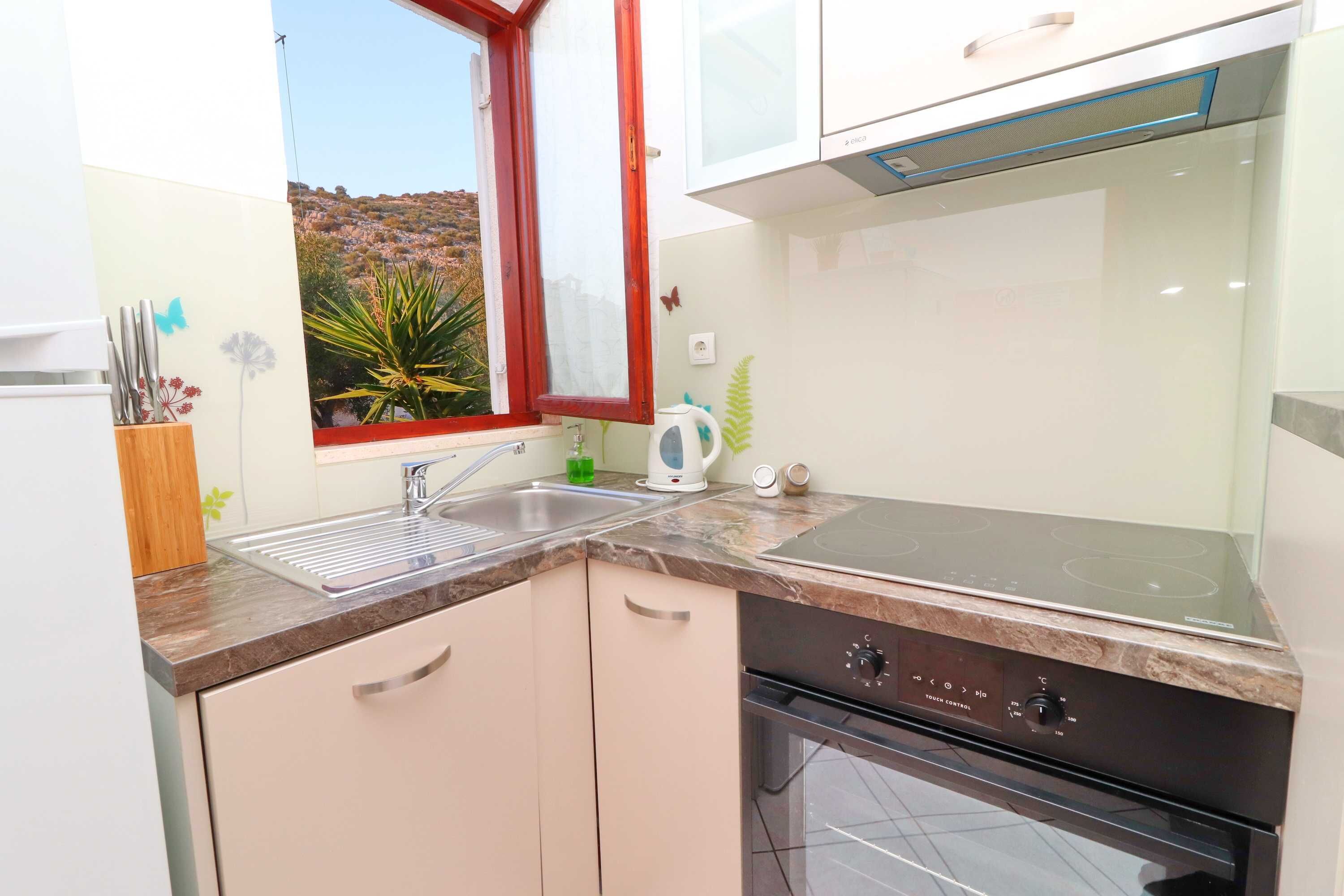 شقة (Seafront Apartments Anthony - Two Bed) | مطبخ خاص | ثلاجة