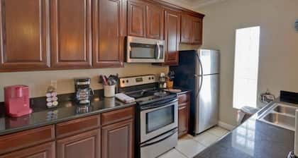 Cozy 2 bedroom 2 bath condo located minutes from the beach and business district