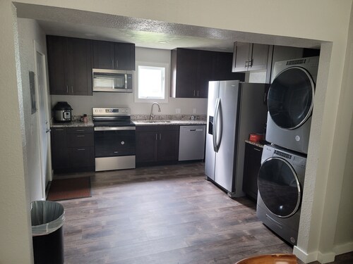 This house is seven minutes to the college world series games.