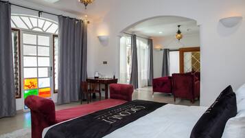 Exclusive Suite | 1 bedroom, in-room safe, individually furnished, iron/ironing board