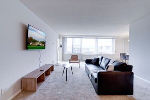Business Apartment, 3 Bedrooms, City View | Living area | 40-inch Smart TV with cable channels, books - Exceptional Apartment  Crystal City (Arlington)