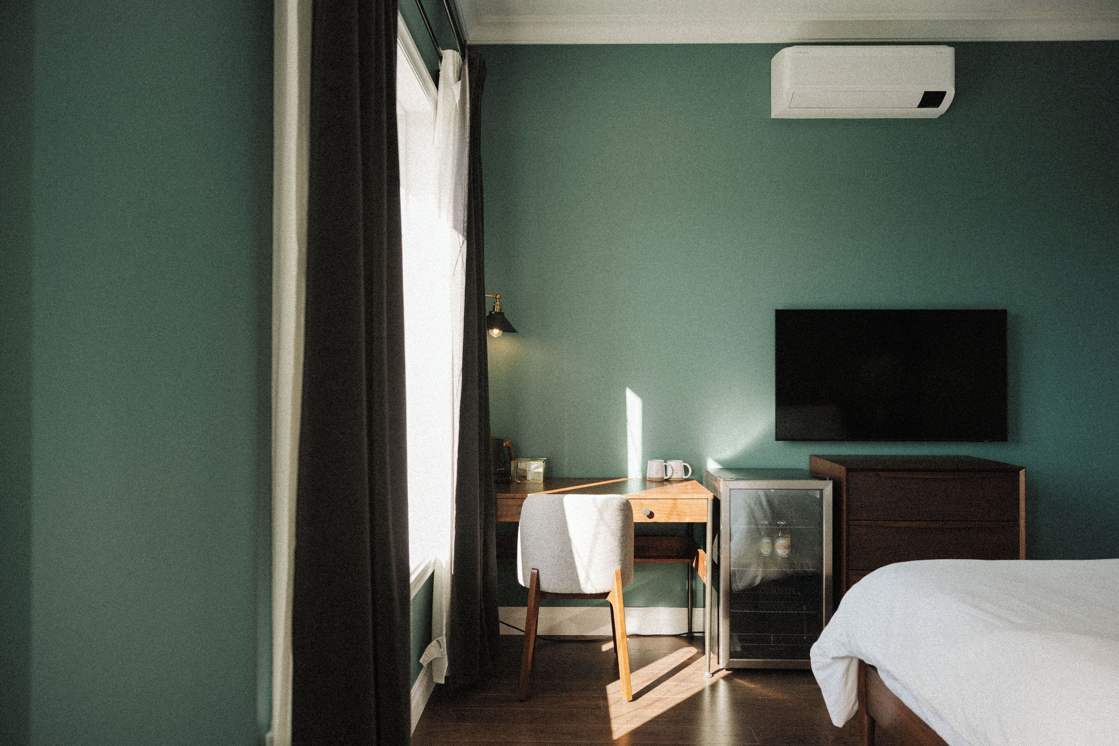 Hypo-allergenic bedding, pillowtop beds, desk, laptop workspace