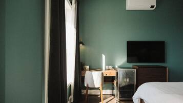 Hypo-allergenic bedding, pillowtop beds, desk, laptop workspace