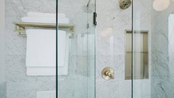 Shower, rainfall showerhead, hair dryer, towels