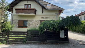 A two-story building with a balcony, labeled "SEEHAUS 12". - See Haus - Podmaniczky (Balatonfoldvar)