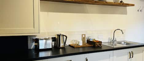 Fridge, coffee/tea maker, toaster, high chair