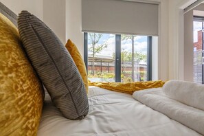 1 habitación, tabla de planchar con plancha, wifi gratis y ropa de cama 