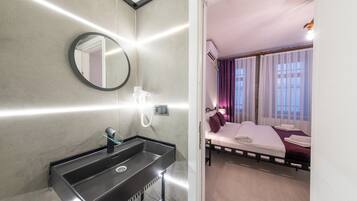 Standard Room | Bathroom | Shower, eco-friendly toiletries, hair dryer, slippers