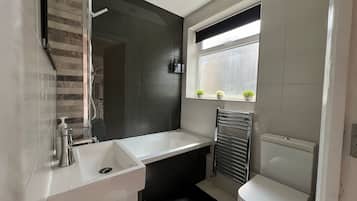 Hair dryer, towels, soap, shampoo