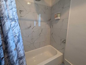 Hair dryer, towels, soap, shampoo