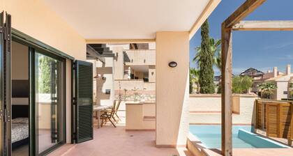 Appartement 'El Oasis Martinica 8 Bajo A' avec piscine partagée, Wi-Fi et climatisation