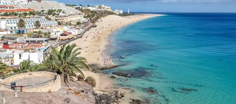 Vacation Apartment 'Precioso Triple En Jandía Beach' with Sea View, Shared Pool and Wi-Fi