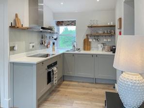Dishwasher, high chair, cookware/dishes/utensils