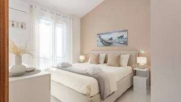 2 dormitorios, tabla de planchar con plancha, wifi gratis y ropa de cama